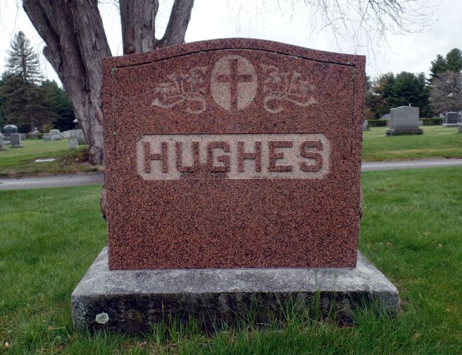 The grave of Gunner John Francis Hughes and his parents